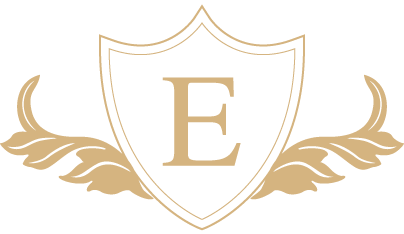 A green and gold shield with the letter e in it.